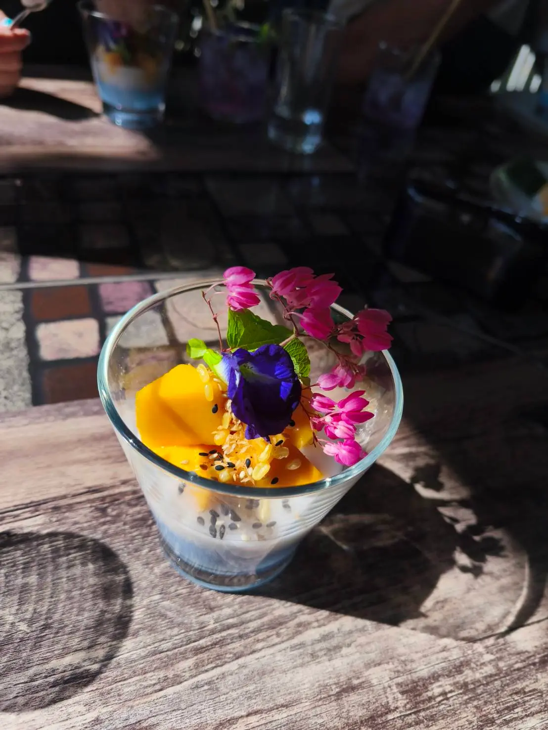 Traditional Thai cooking in outdoor garden kitchen at Trichada