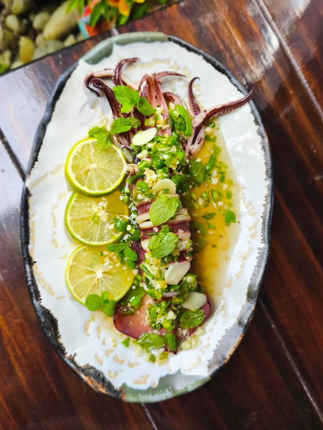 Happy cooking class participants enjoying Thai food in Chiang Mai